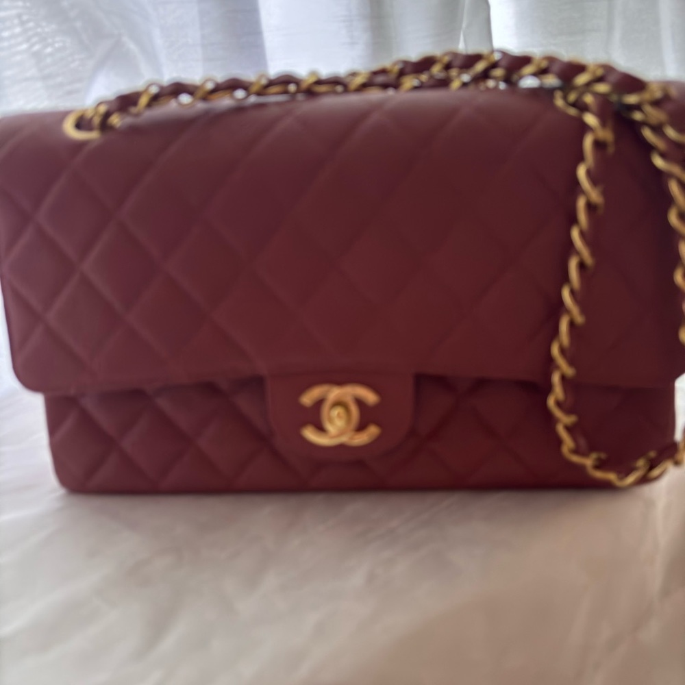 This is an authentic chanel  quilted medium doble flat in bergamot,